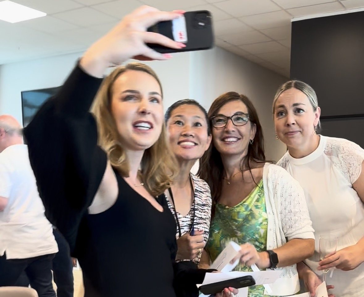 Four guests take a selfie together
