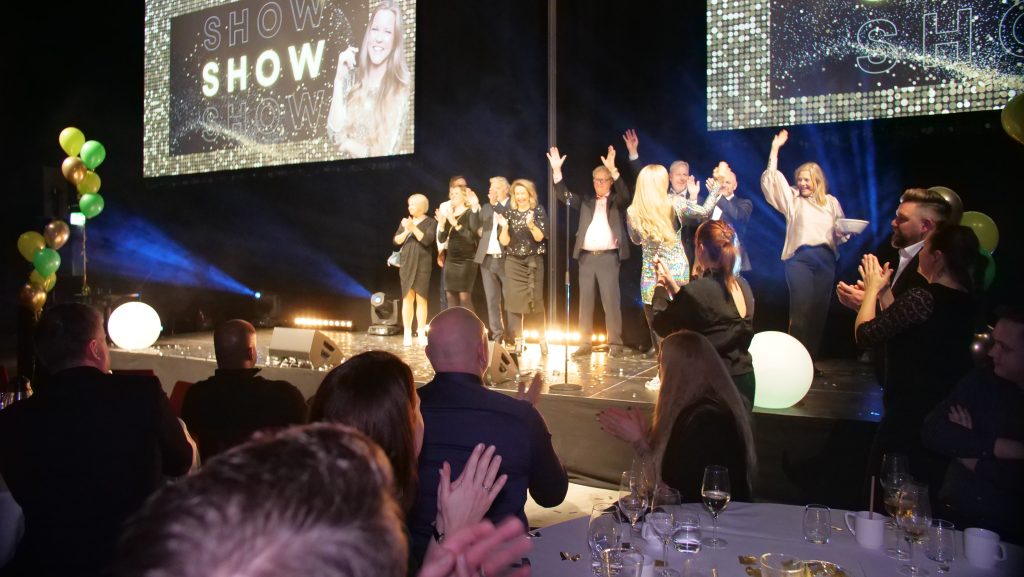 The winning team on stage